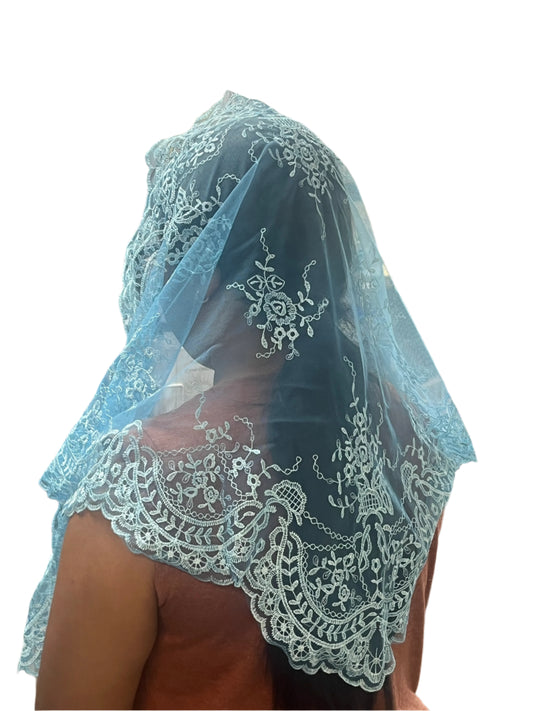 Sky blue Spanish lace mantilla chapel veil with floral motifs and scalloped edges, 51 inches long.
