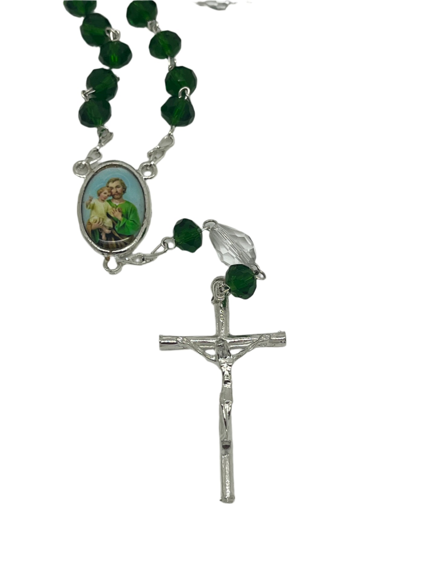 Silver and green crystal St. Joseph rosary with clear Our Father beads and detailed silver crucifix centerpiece