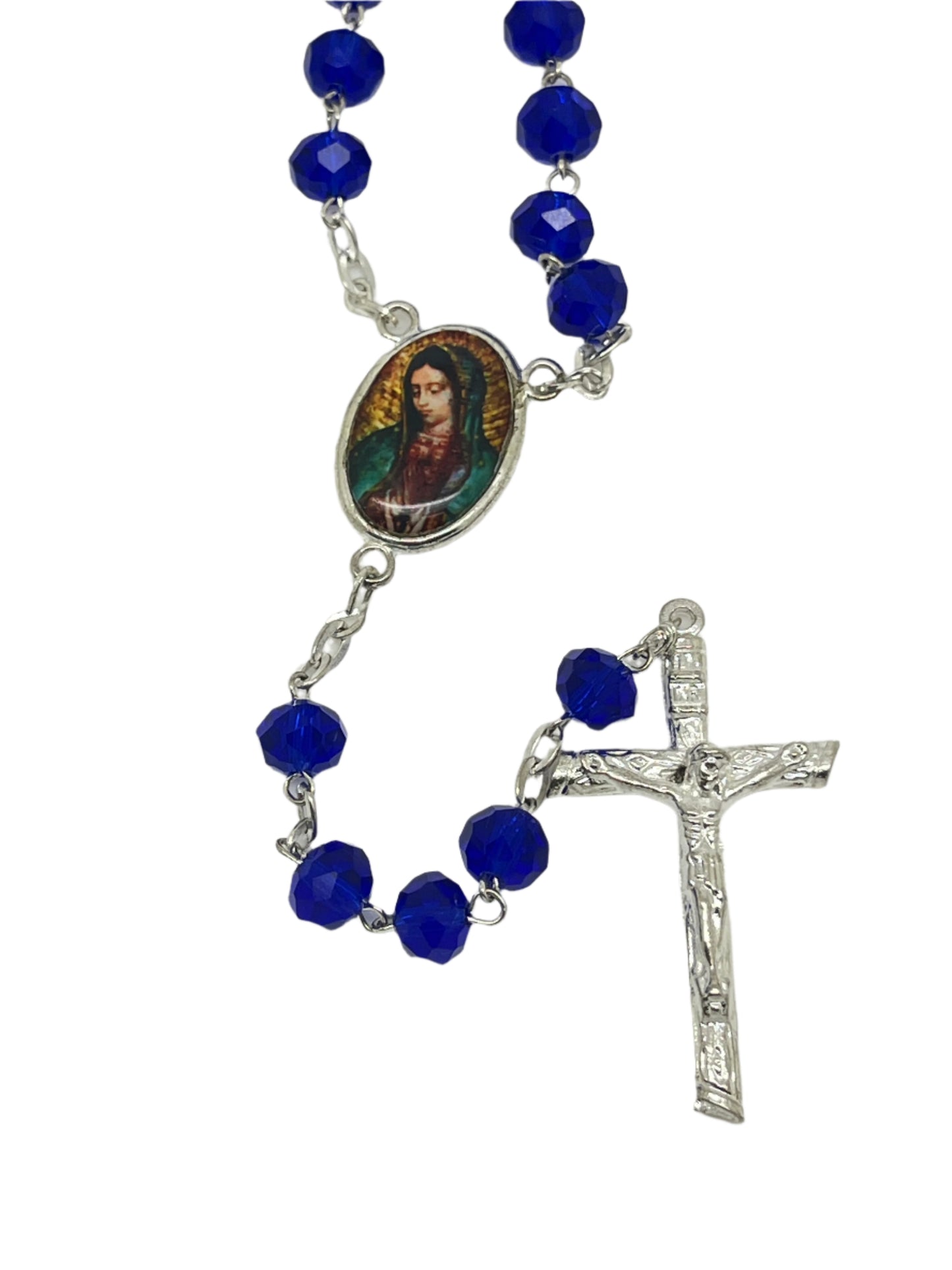 Deep blue crystal rosary with Our Lady of Guadalupe centerpiece and detailed silver crucifix on linked chain