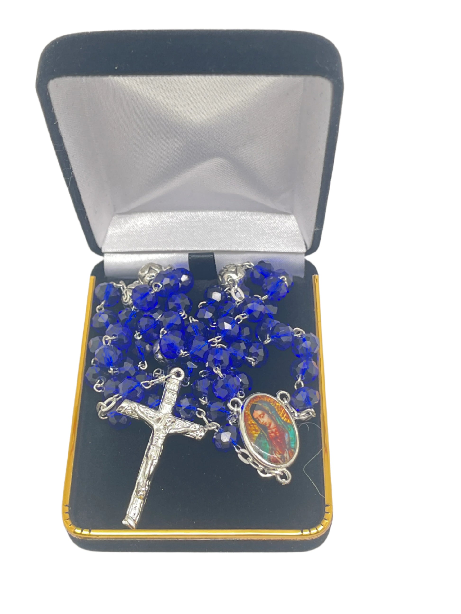 Our Lady of Guadalupe deep blue crystal rosary with silver crucifix and detailed image, displayed in black velvet gift box