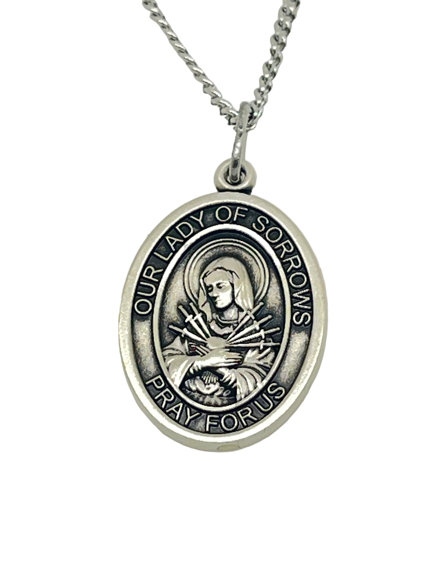 3/4" Our Lady of Sorrows sterling silver oval medal pendant on 18" rhodium curb chain with engraved devotional inscription