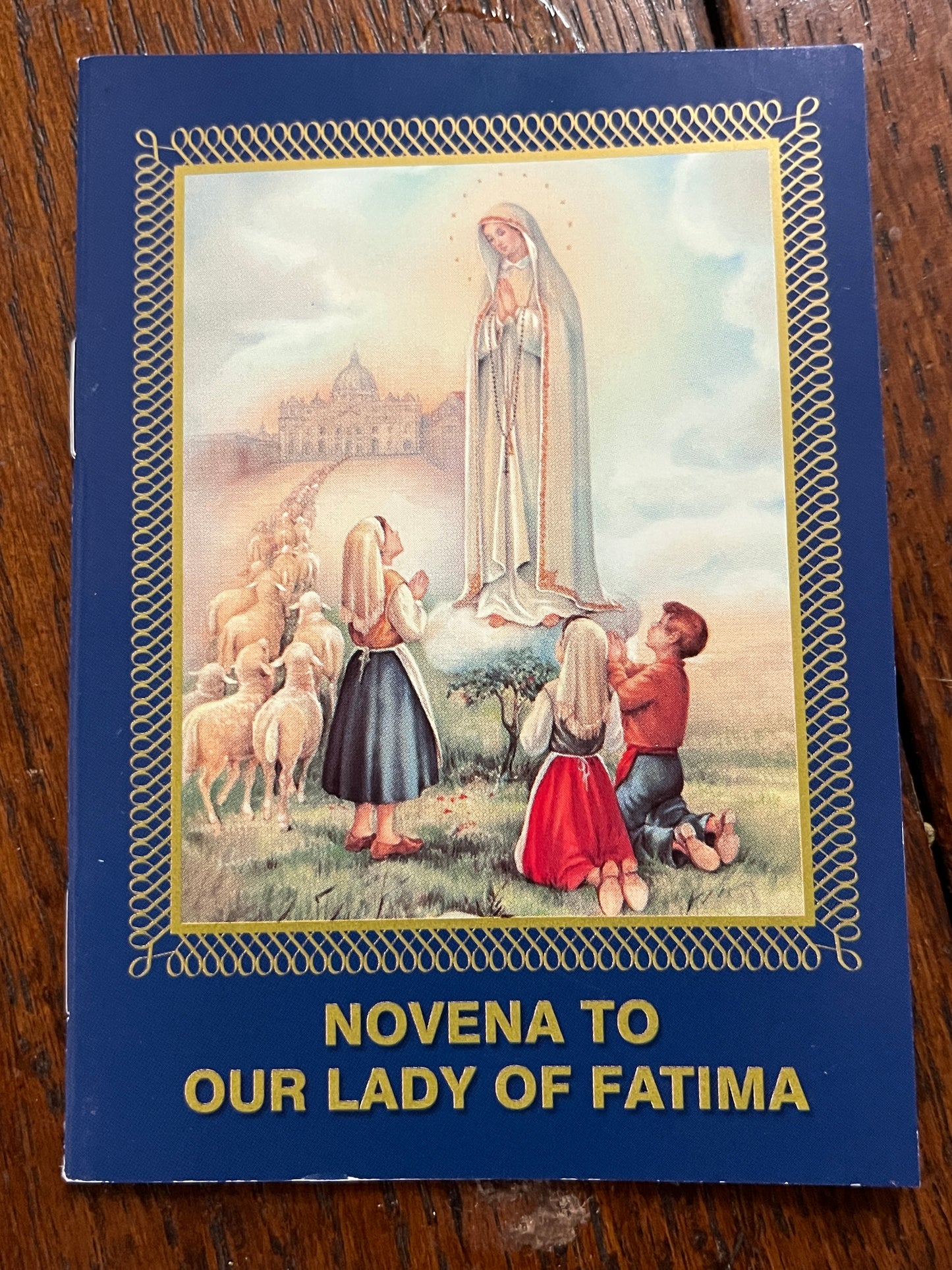 24-page Novena to Our Lady of Fatima prayer booklet with illustrated cover of children and shepherds in devotion