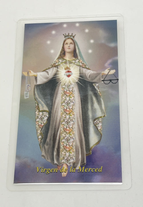 4" x 6" laminated holy card of Virgin de la Merced with detailed sacred heart image and prayer on back
