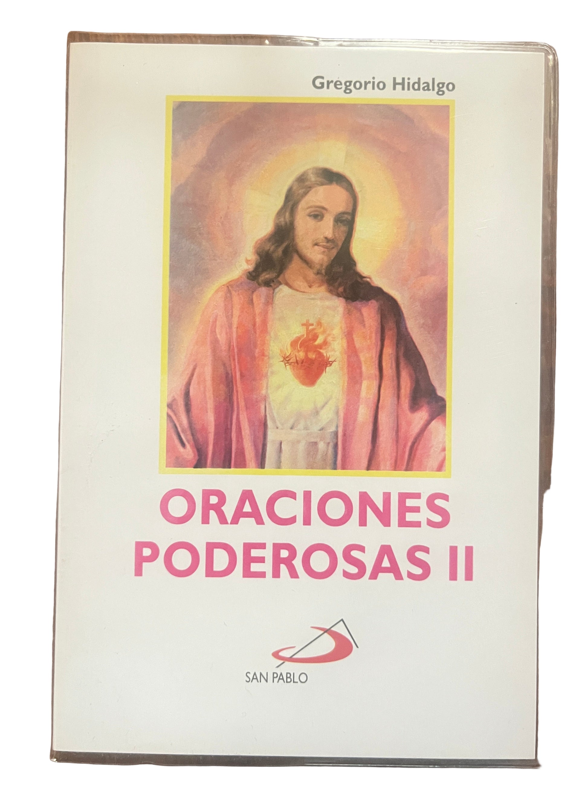 Paperback book Oraciones Poderosas II with sacred heart of Jesus image and San Pablo publisher logo on white cover