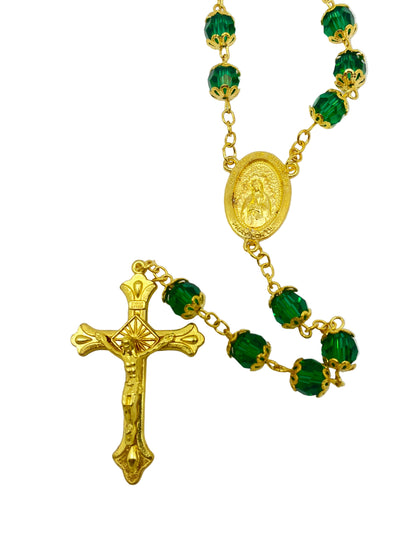 Gold green crystal bead rosary with Our Lady of Guadalupe centerpiece and detailed gold-tone crucifix design
