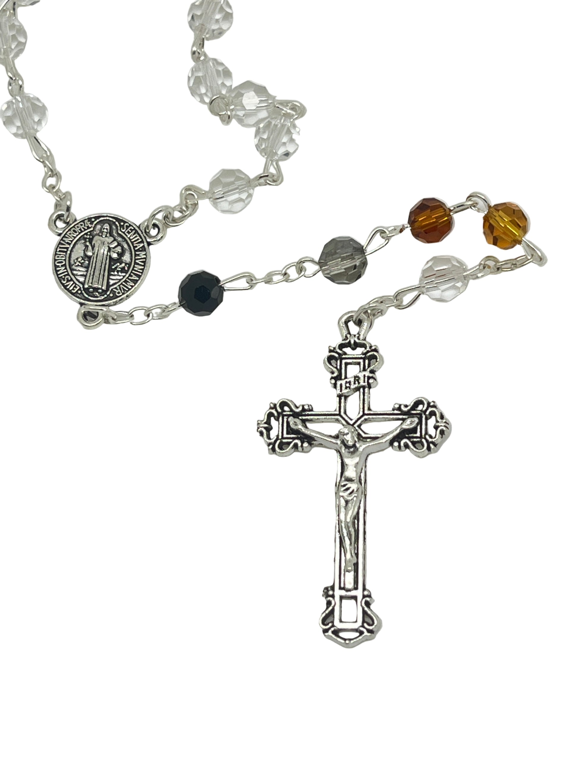Multi-color Saint Benedict rosary with black, amber, brown, and clear crystals, silver crucifix, and detailed medal centerpiece