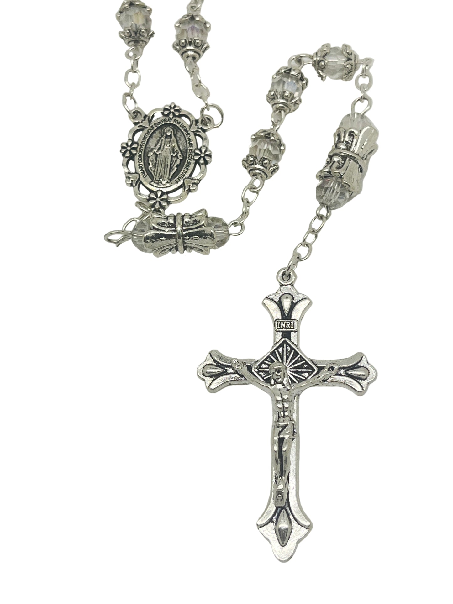 Silver capped crystal bead rosary with crowned Our Father beads, silver Miraculous Medal centerpiece, and detailed crucifix