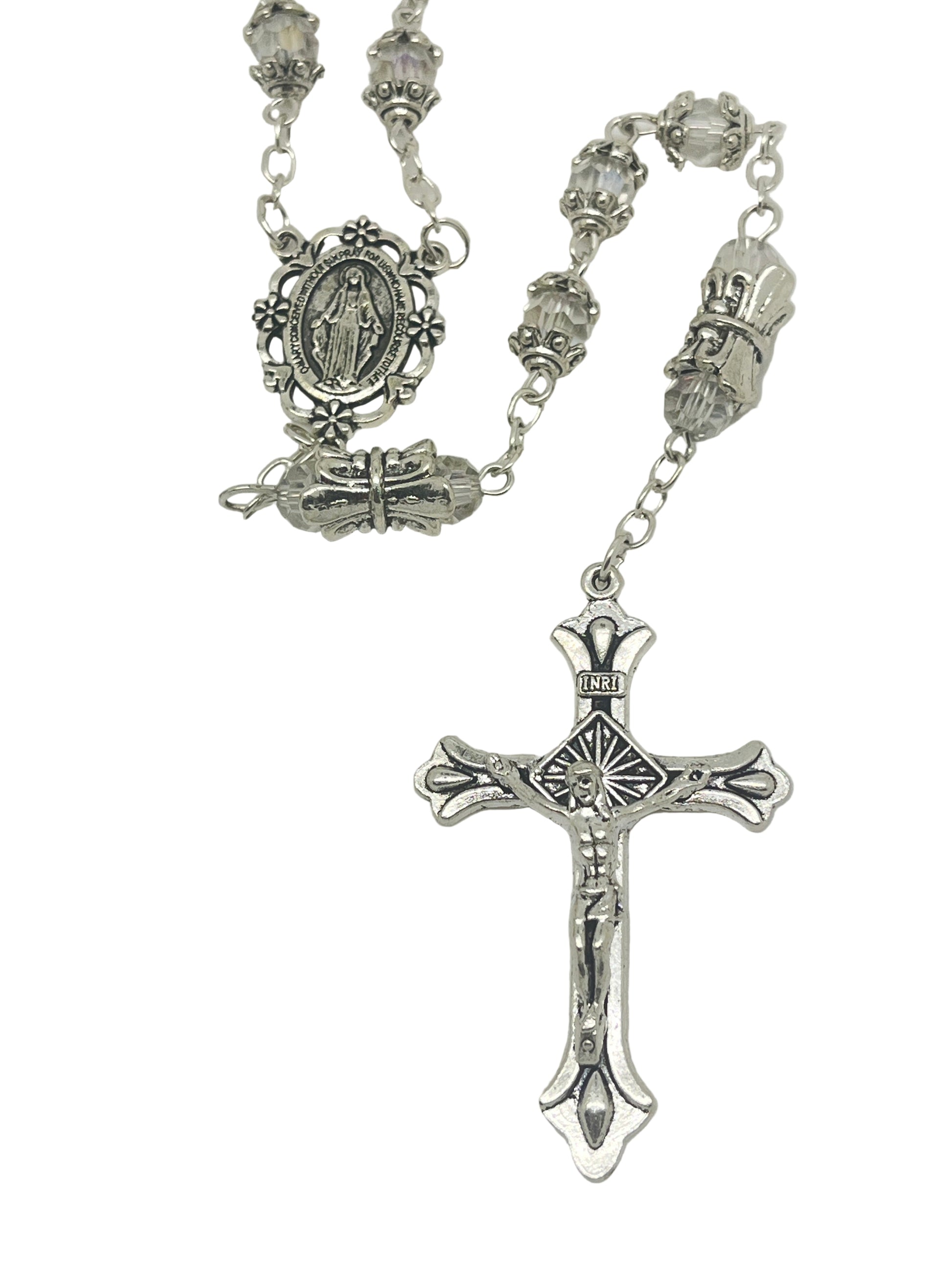 Silver capped crystal bead rosary with crowned Our Father beads, silver Miraculous Medal centerpiece, and detailed crucifix