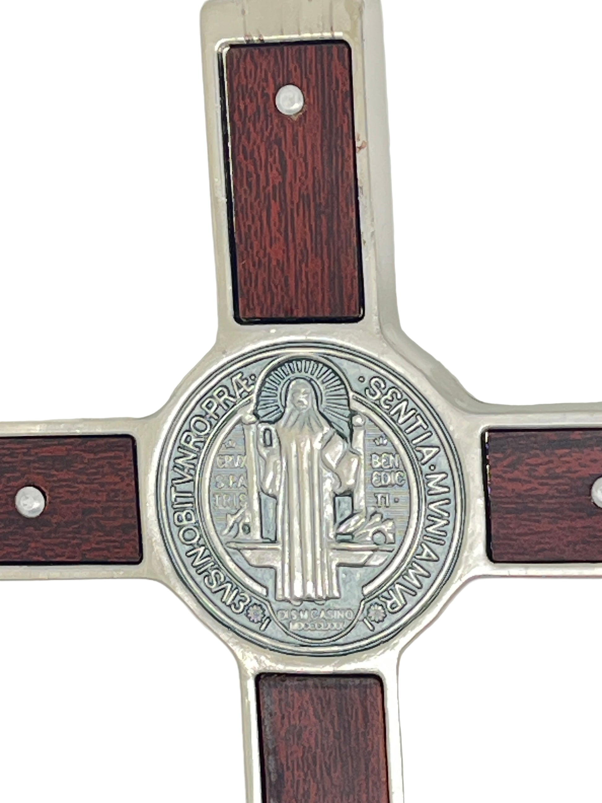 Close-up of Saint Benedict medal on metal and olive wood inlaid 7 1/2" wall crucifix with detailed engraving