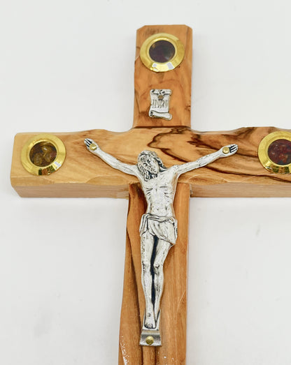 Hand-carved olive wood crucifix with silver Jesus figure, INRI plaque, and four holy elements in gold-rimmed glass vials