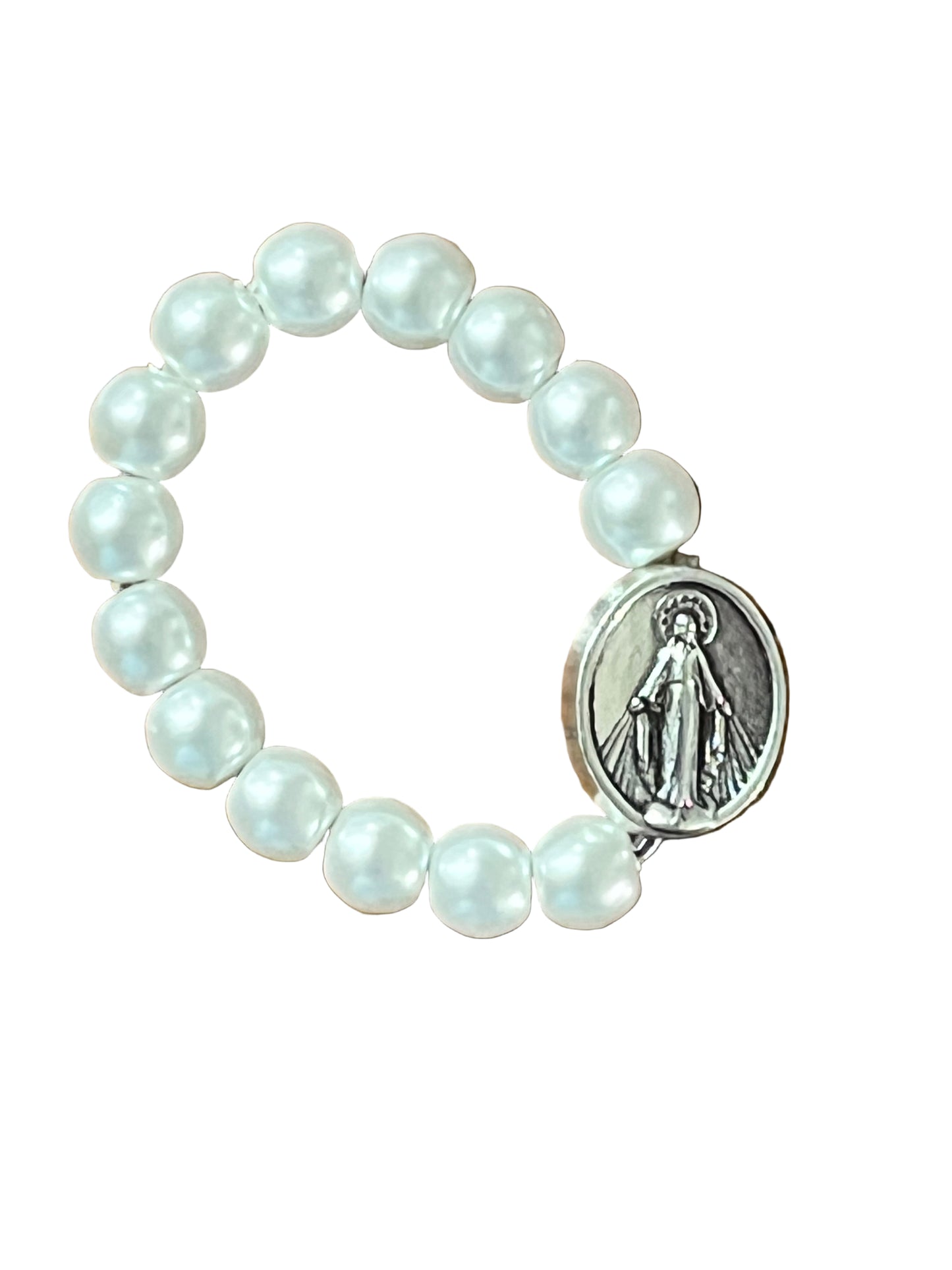 Stretch ring with white beads and silver tone Miraculous Medal centerpiece on white background