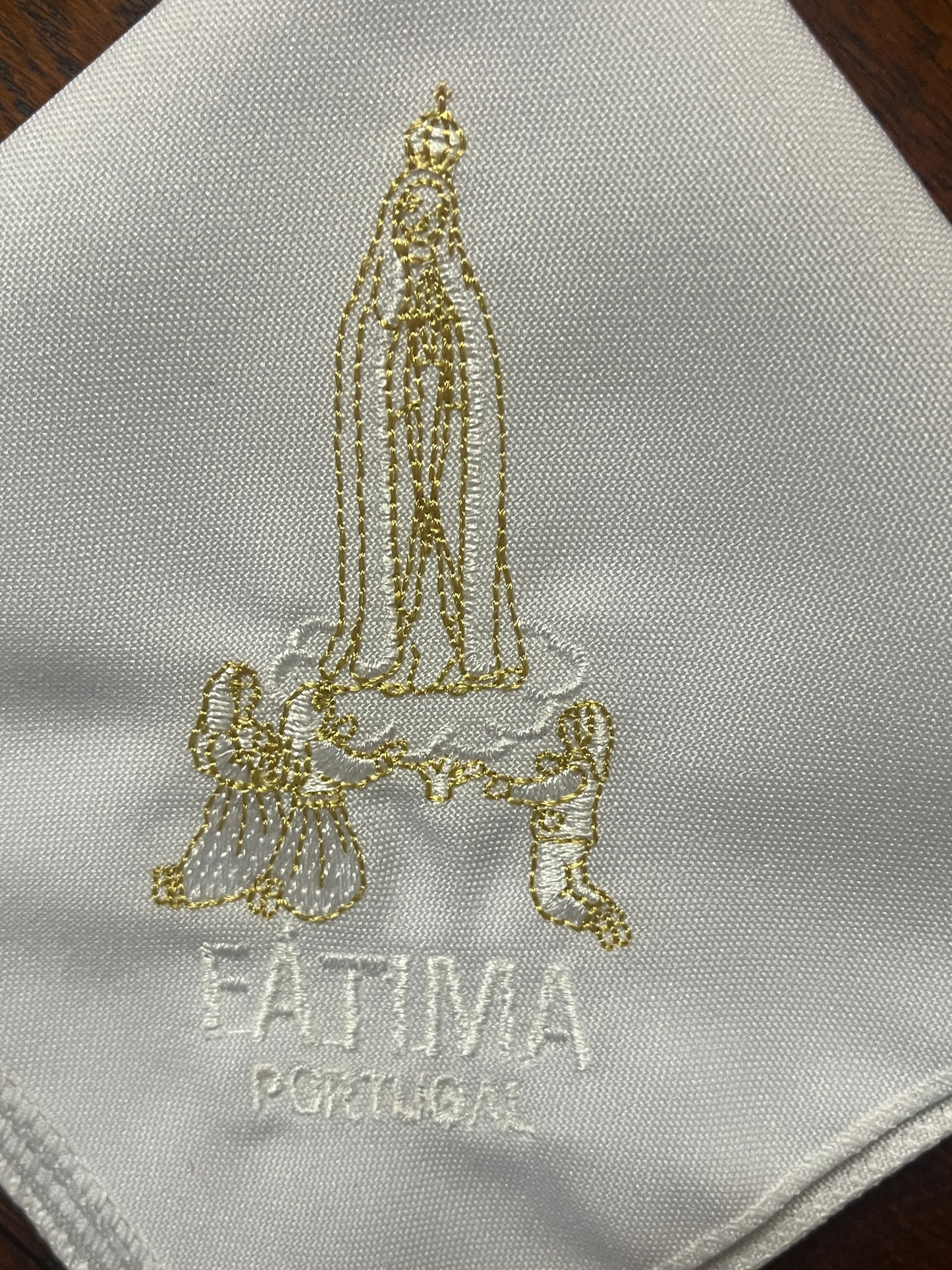 White Our Lady of Fatima handkerchief with gold embroidered apparition and white text on white fabric