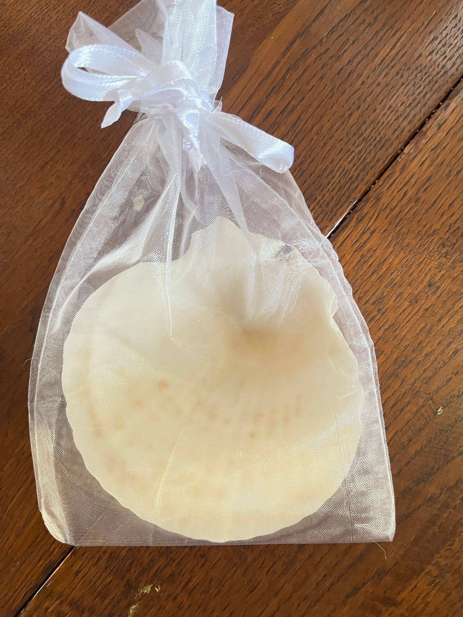 Natural Baptism shell 4 1/2 inches in delicate white organza bag, unique sea shell gift for baptism ceremonies.