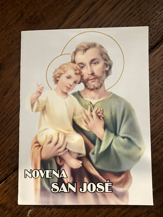 Prayer booklet titled Novena San José featuring Saint Joseph holding baby Jesus with halos on white background