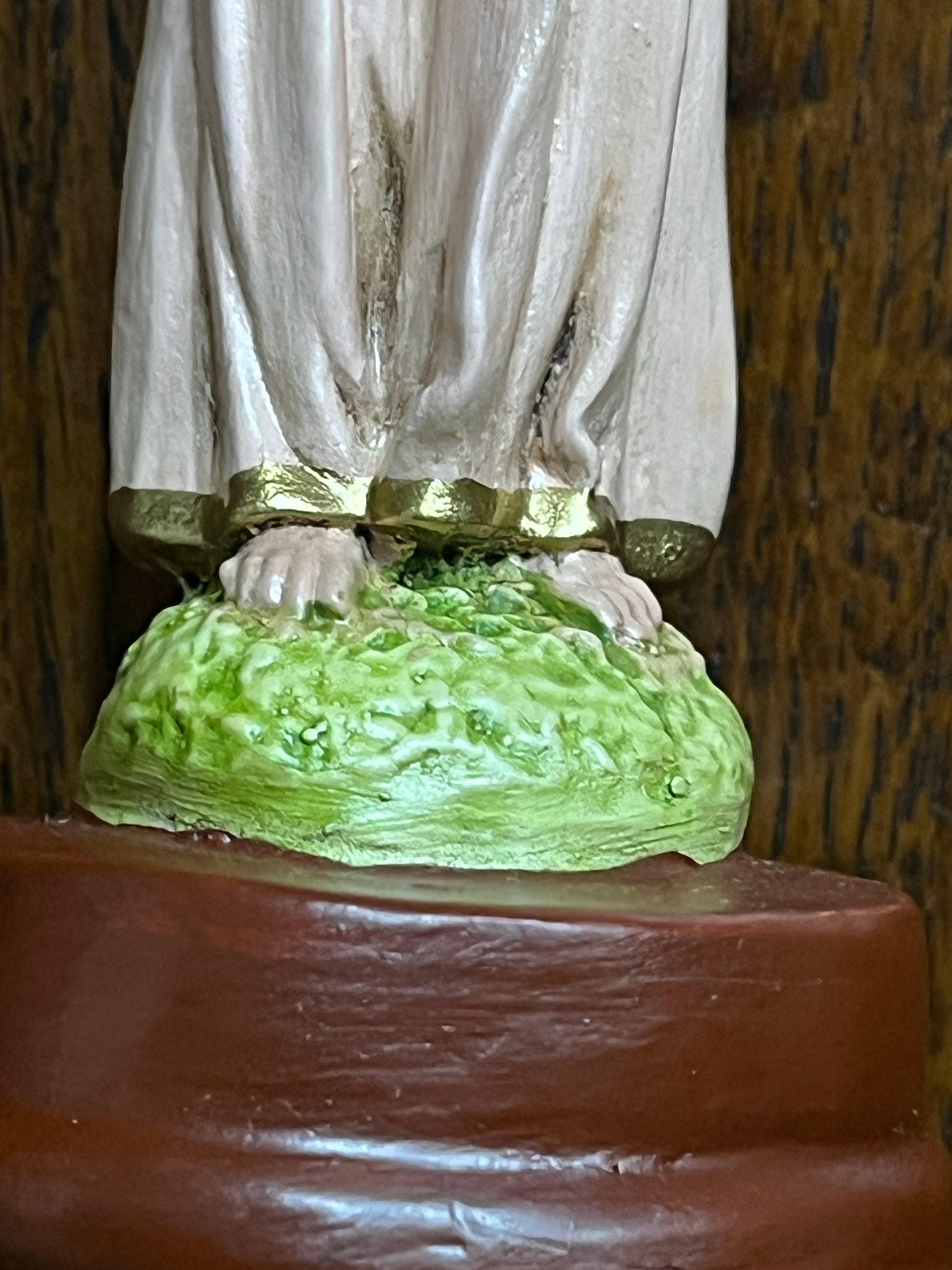 5 1/2" Child Mary statue with hand-painted robe details standing on textured green base with brown pedestal