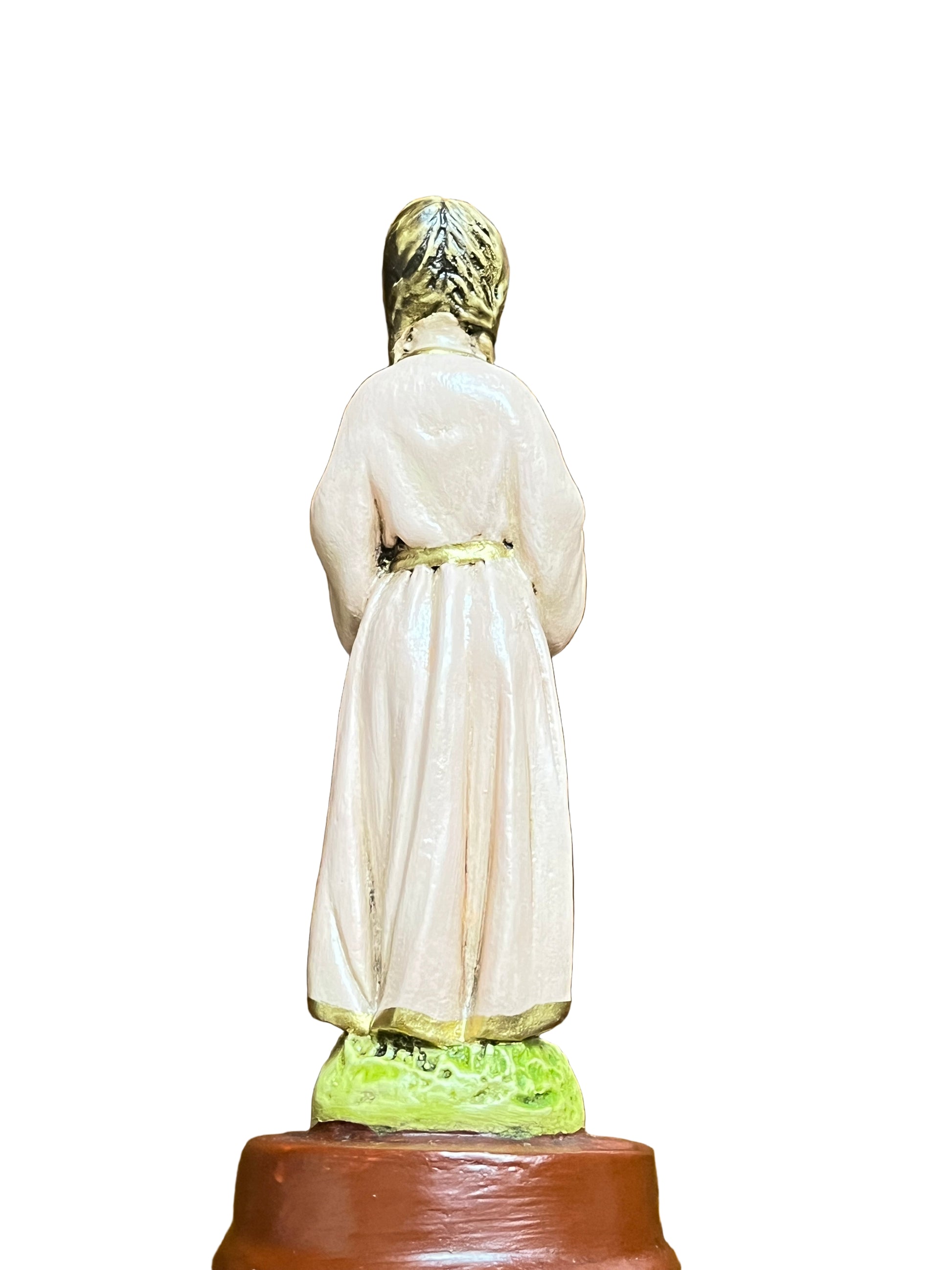 5 1/2" Child Mary statue in white robe with gold accents standing on green and brown base, rear view detailed craftsmanship