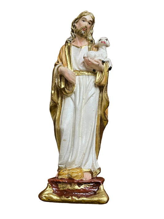 5" statue of the Good Shepherd holding a white lamb, wearing gold and white robes on decorative base