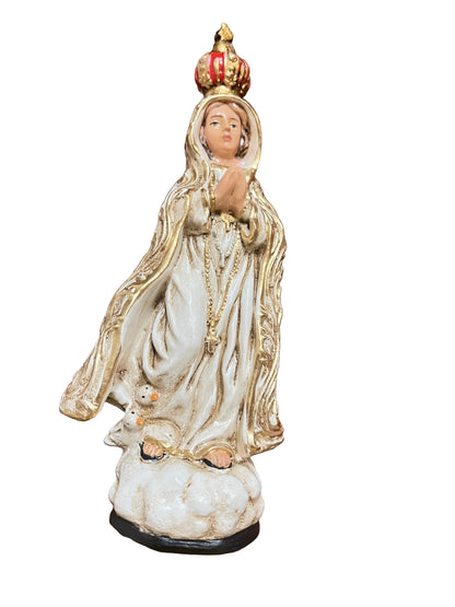 6” Our Lady of Fatima statue with gold-trimmed white robe and red crown standing on cloud base handcrafted in Colombia