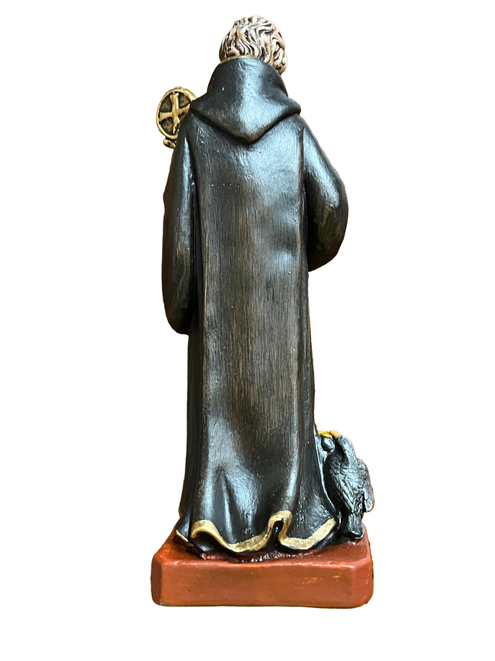 6 1/2" statue of St. Benedict standing with long dark robe, staff, and raven on red base, hand painted details