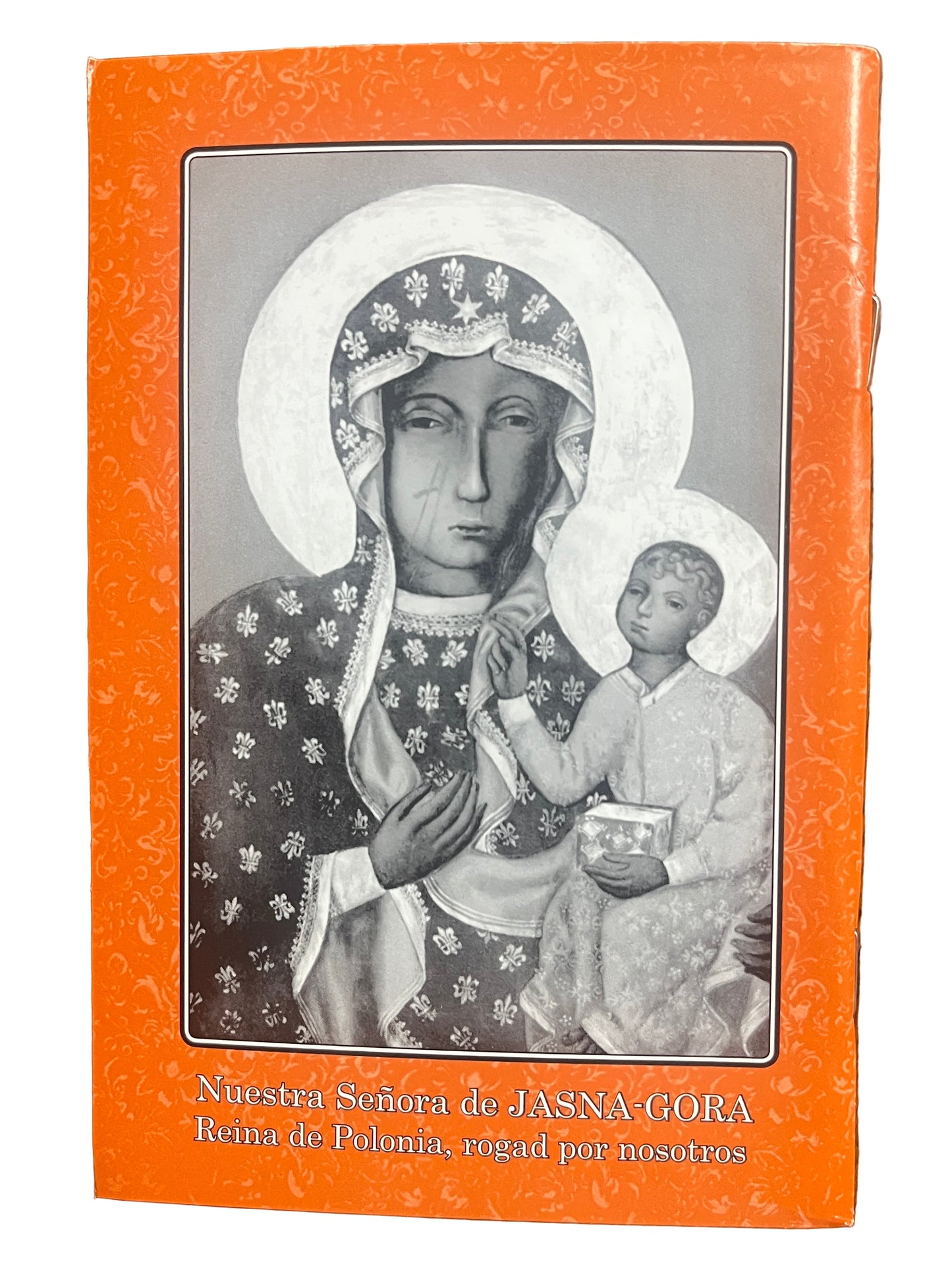 Prayer book La Pieta El Original with image of Our Lady of Jasna Gora and child Jesus on orange cover