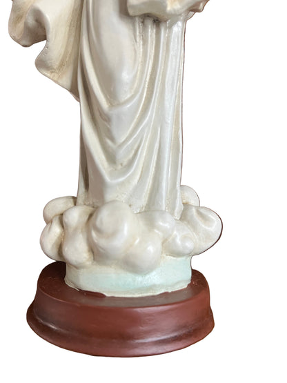 Base of Our Lady of Medjugorje statue with white cloud details on brown wooden pedestal handcrafted and hand-painted