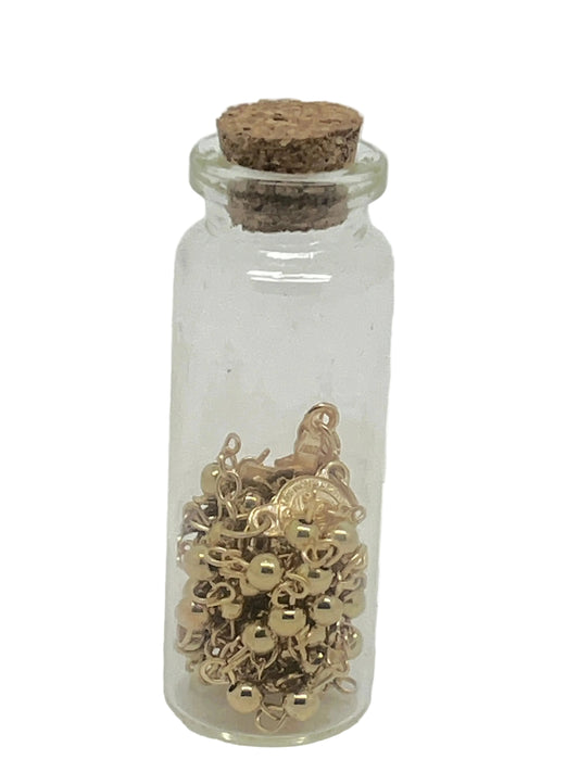 Gold Benedict Rosary in a Glass Bottle