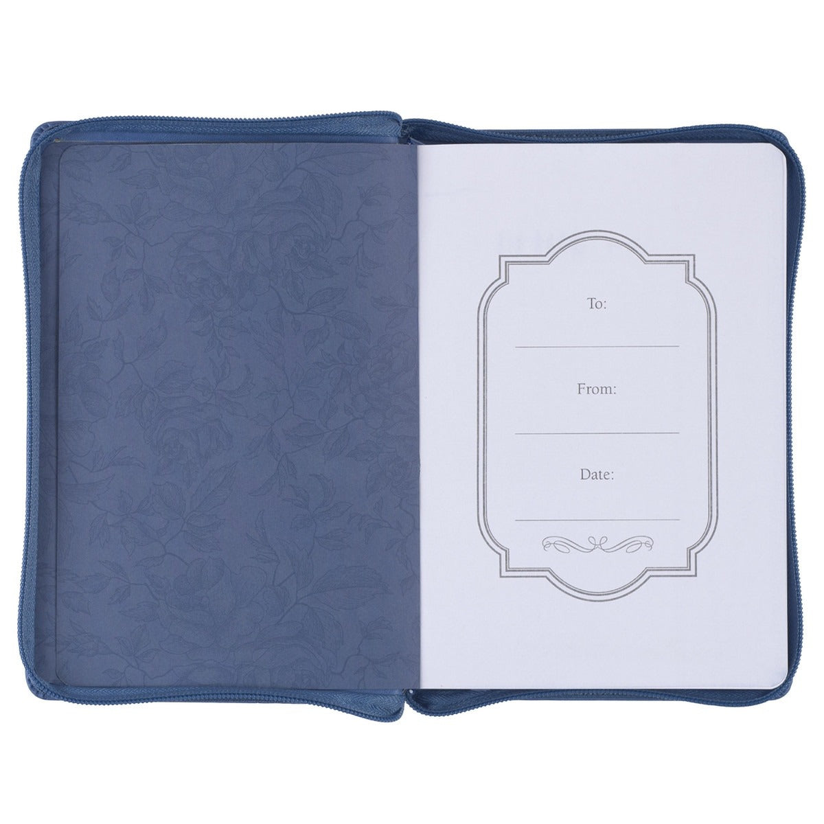 Open blue faux leather journal with zipper displaying decorative floral inner cover and gift inscription page