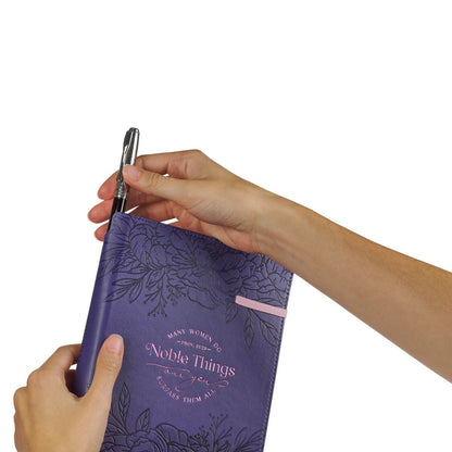 Purple faux leather journal with floral design, Noble Things Proverbs 31:29 quote, and attached pen holder