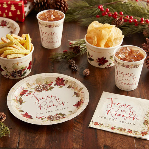 Set of Jesus is the Reason holiday paper cups, plates, and napkins with festive floral and pinecone design