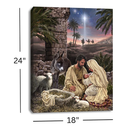 Jesus is Lord illuminated canvas print 18x24 showing nativity scene with Mary, Joseph, baby Jesus, animals, and bright star above.