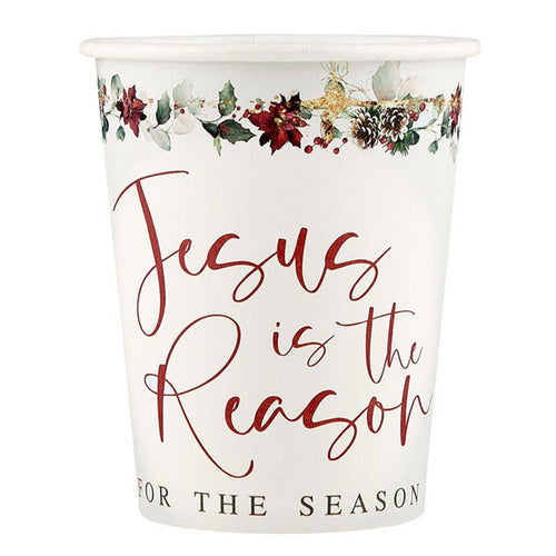 White paper cup with "Jesus is the Reason for the Season" in red script and festive holly and poinsettia border design