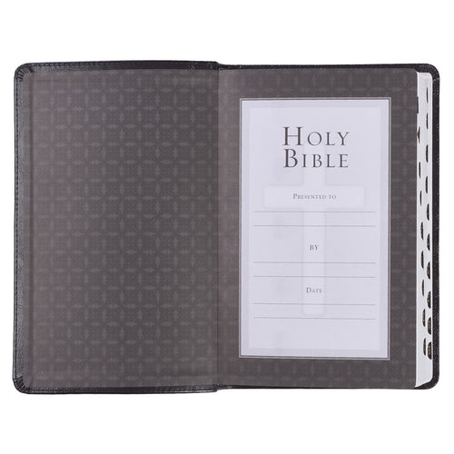 Black Faux Leather King James Version Deluxe Gift Bible open to dedication page with thumb index tabs on side