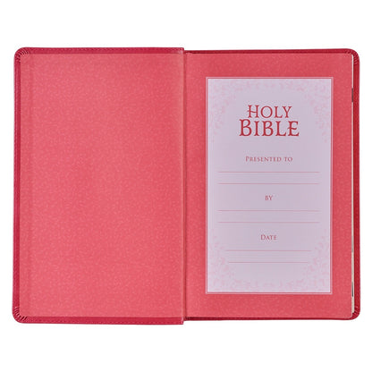 Open pink faux leather King James Version Deluxe Gift Bible showing personalized presentation page with decorative border