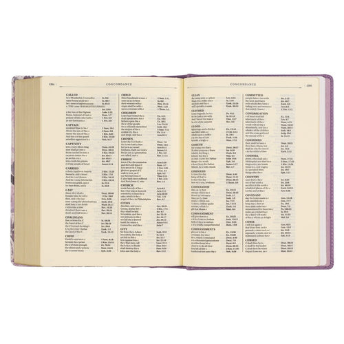 Open Purple Floral Faux Leather Hardcover Note-taking Bible showing concordance pages with clear text on creamy paper