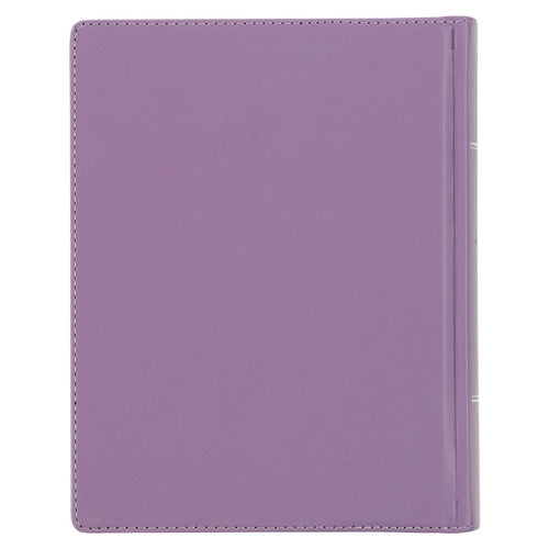 Purple floral faux leather hardcover King James Version note-taking Bible closed on white background