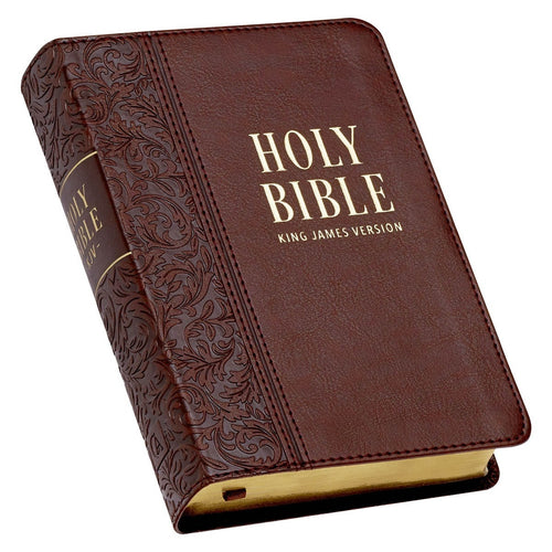 Medium brown faux leather compact King James Bible with large print, embossed floral spine design, and gold-edged pages
