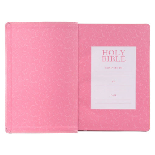Pink faux leather full-size King James Version Bible with floral embossing and presentation page inside cover