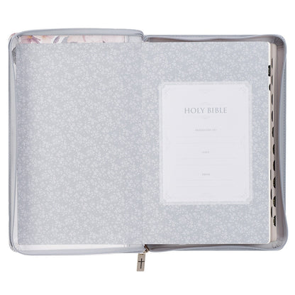 Open Frosty Gray and Pink Floral faux leather King James Version Bible with floral endpapers and zipped cover with cross charm pull