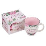 Ceramic coffee mug with pink interior, floral design, and "I Love That You’re My Mom" sentiment with matching gift box