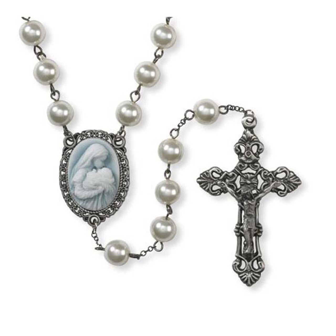 Rosary with faux pearl beads, ornate silver crucifix, and cameo centerpiece of Mary kissing baby Jesus on blue background