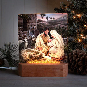 Wooden Jesus is Lord tabletop nightlight with illuminated nativity scene of Mary, Joseph, baby Jesus, and animals