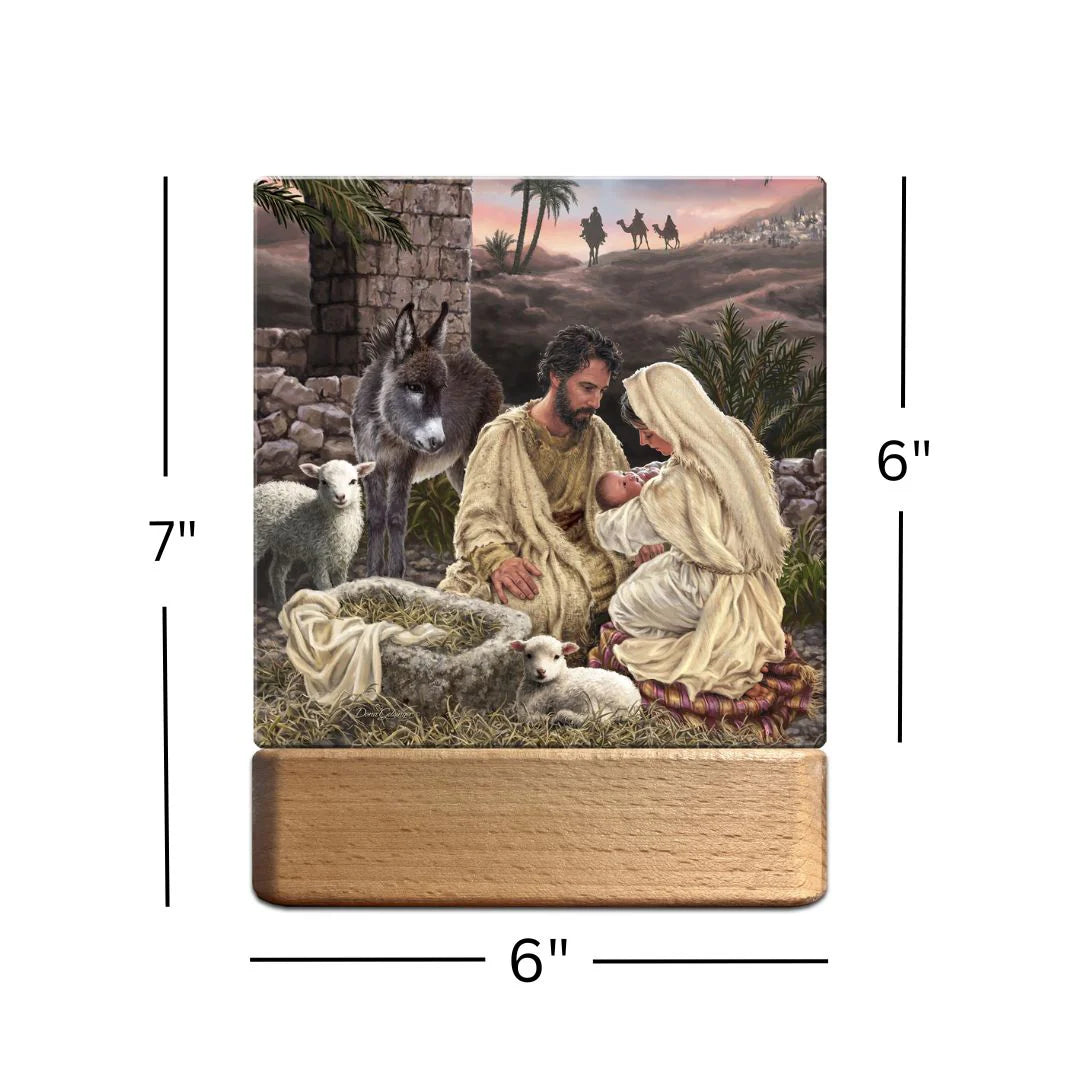 Wooden Jesus is Lord tabletop ornament nightlight showing Mary, Joseph, and baby Jesus with animals and three wise men in background