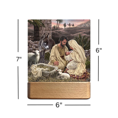 Wooden Jesus is Lord tabletop ornament nightlight showing Mary, Joseph, and baby Jesus with animals and three wise men in background