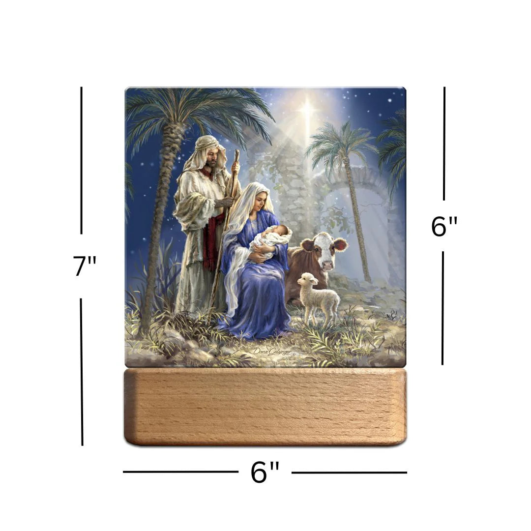 Holy Night tabletop ornament plaque nightlight showing Mary, Joseph, baby Jesus, cow, and lamb with glowing star above