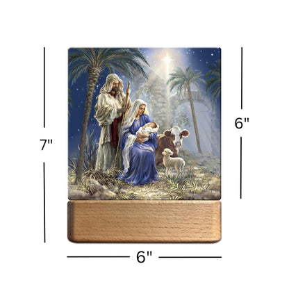 Holy Night tabletop ornament plaque nightlight showing Mary, Joseph, baby Jesus, cow, and lamb with glowing star above