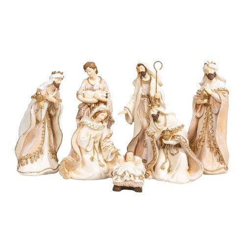7-piece Nativity set with gold trim, fabric look figurines including Mary, Joseph, Baby Jesus, and the Three Wise Men, 8.5" H