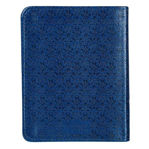 Navy blue faux leather cover of Faith’s Checkbook One-Minute Devotions with embossed decorative pattern