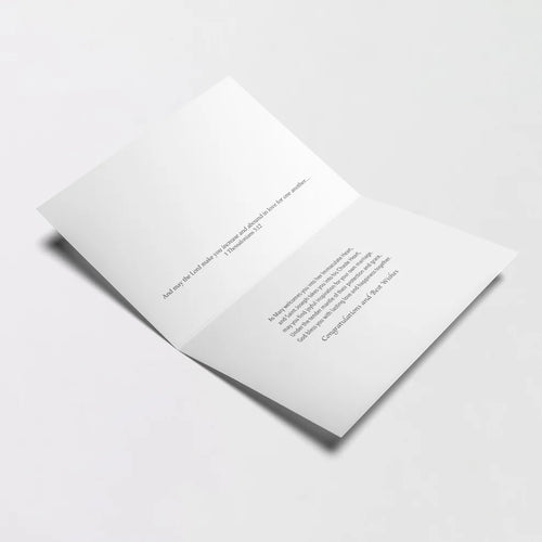 Open Holy Matrimony greeting card with printed inspirational blessing text inside on white background
