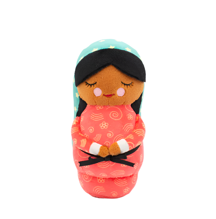 Mini plush doll of Our Lady of Guadalupe 5 1/2 inches tall with turquoise mantle and coral pink dress design.