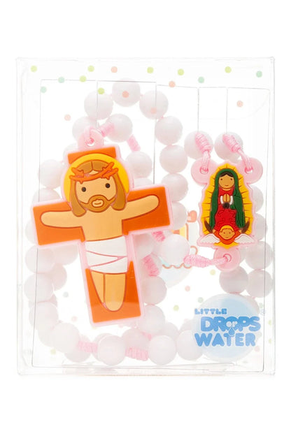 Pink rosary with cartoon-style crucifix and Our Lady of Guadalupe centerpiece in clear packaging